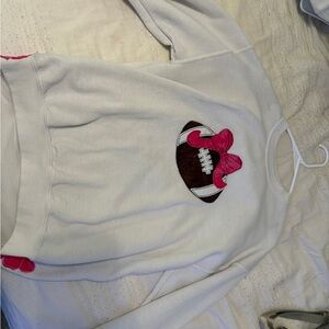 White Sweatshirt with Football and Bow Design